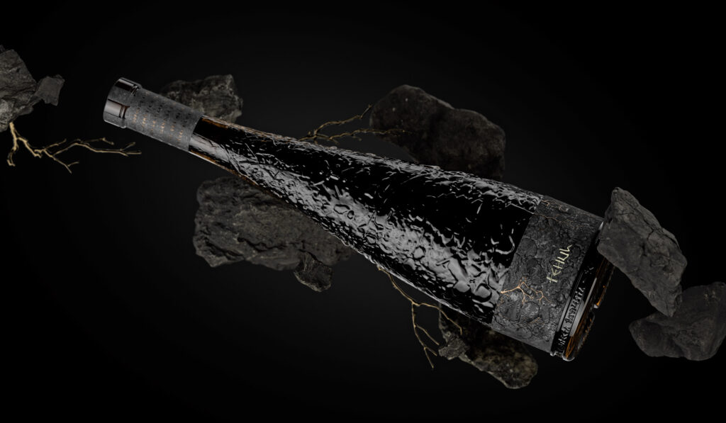 Bottle design for Tehul wine by Nano Alfonsin Studio. Textured black surface, volcanic rock background, premium packaging.